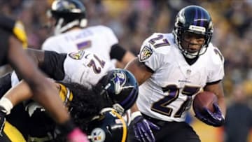 Oct 20, 2013; Pittsburgh, PA, USA; Baltimore Ravens running back Ray Rice (27) runs the ball against the Pittsburgh Steelers during the second half at Heinz Field. The Steelers won the game, 19-16. Mandatory Credit: Jason Bridge-USA TODAY Sports