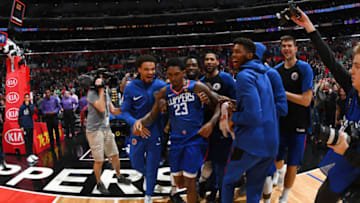 LOS ANGELES, CA - MARCH 17: Lou Williams #23 of the LA Clippers celebrates with his team after scoring a game-winner against the Brooklyn Nets on March 17, 2019 at STAPLES Center in Los Angeles, California. NOTE TO USER: User expressly acknowledges and agrees that, by downloading and/or using this Photograph, user is consenting to the terms and conditions of the Getty Images License Agreement. Mandatory Copyright Notice: Copyright 2019 NBAE (Photo by Adam Pantozzi/NBAE via Getty Images)