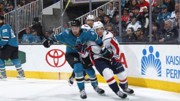SAN JOSE, CA - MARCH 10: Brenden Dillon #4 of the San Jose Sharks skates against T.J. Oshie #77 of the Washington Capitals at SAP Center on March 10, 2018 in San Jose, California. (Photo by Rocky W. Widner/NHL/Getty Images)