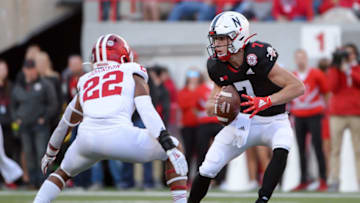 LINCOLN, NE - OCTOBER 26: Quarterback Luke McCaffrey #7 of the Nebraska Cornhuskers looks to pitch against defensive back Jamar Johnson #22 of the Indiana Hoosiers at Memorial Stadium on October 26, 2019 in Lincoln, Nebraska. (Photo by Steven Branscombe/Getty Images)