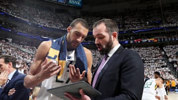 SALT LAKE CITY, UT - APRIL 22: Rudy Gobert #27 and Assistant Coach Alex Jensen of the Utah Jazz talk during Game Four of Round One of the 2019 NBA Playoffs against the Houston Rockets on April 22, 2019 at vivint.SmartHome Arena in Salt Lake City, Utah. NOTE TO USER: User expressly acknowledges and agrees that, by downloading and/or using this photograph, user is consenting to the terms and conditions of the Getty Images License Agreement. Mandatory Copyright Notice: Copyright 2019 NBAE (Photo by Melissa Majchrzak/NBAE via Getty Images)