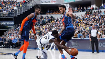OKC Thunder guard Terrance Ferguson defends Darren Collison (Photo by Joe Robbins/Getty Images)