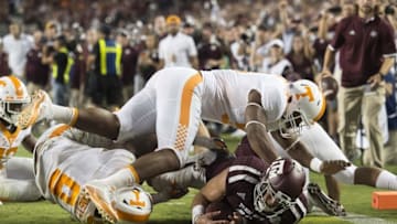 Oct 8, 2016; College Station, TX, USA; Texas A&M Aggies quarterback Trevor Knight (8) scores the game winning touchdown during the second overtime against the Tennessee Volunteers at Kyle Field. The Aggies defeated the Volunteers 45-38 in overtime. Mandatory Credit: Jerome Miron-USA TODAY Sports
