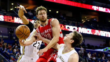 Mar 25, 2015; New Orleans, LA, USA; New Orleans Pelicans forward Anthony Davis (23) and center Omer Asik (3) defend against Houston Rockets forward Donatas Motiejunas (20) during the first quarter of a game at the Smoothie King Center. Mandatory Credit: Derick E. Hingle-USA TODAY Sports