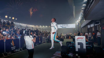 SINGAPORE - SEPTEMBER 16: Race winner Lewis Hamilton of Great Britain and Mercedes GP celebrates in parc ferme during the Formula One Grand Prix of Singapore at Marina Bay Street Circuit on September 16, 2018 in Singapore. (Photo by Lars Baron/Getty Images)