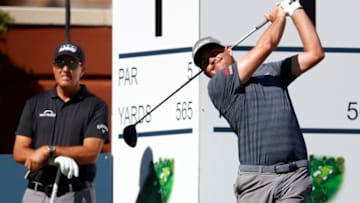 Former St. John's golf star Keegan Bradley hits off the first tee as Phil Mickelson looks on during a practice round prior to the Charles Schwab Challenge at Colonial Country Club on June 10, 2020 in Fort Worth, Texas. (Photo by Tom Pennington/Getty Images)