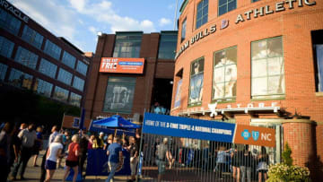 Fans enter the stadium on game day at Durham Bulls Athletic Park in Durham, North Carolina, on Tuesday, Sept. 20, 2022.Kns Durham Baseball