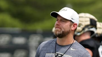 Purdue quarterback coach Brian Brohm watches a drill during a practice, Tuesday, Aug. 2, 2022, at Purdue University in West Lafayette, Ind.Purduefootball080222 Am10137