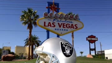 May 11, 2016; Las Vegas, NV, USA; General view of Oakland Raiders helmet at the "Welcome to Fabulous Las Vegas" sign on the Las Vegas strip on Las Vegas Blvd. Raiders owner Mark Davis (not pictured) has pledged $500 million toward building a 65,000-seat domed stadium in Las Vegas at a total cost of $1.4 billion. NFL commissioner Roger Goodell (not pictured) said Davis can explore his options in Las Vegas but would require 24 of 32 owners to approve the move. Mandatory Credit: Kirby Lee-USA TODAY Sports