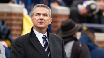 Former Ohio State coach Urban Meyer rewatches a play during the game at Michigan Stadium, Saturday, Nov. 30, 2019. Ohio State defeated Michigan, 56-27.113019 Osu Amb 5 2