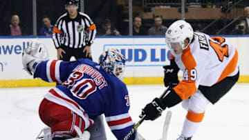 NEW YORK, NEW YORK - SEPTEMBER 26: Henrik Lundqvist #30 of the New York Rangers makes the stop on Joel Farabee #49 of the Philadelphia Flyers during the shootout during a preseason game at Madison Square Garden on September 26, 2019 in New York City. The Rangers defeated the Flyers 2-1 in the shoot-out. (Photo by Bruce Bennett/Getty Images)