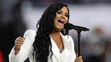 Feb 2, 2020; Miami Gardens, Florida, USA; Recording artist Demi Lovato performs the national anthem prior to the Kansas City Chiefs playing against the San Francisco 49ers in Super Bowl LIV at Hard Rock Stadium. Mandatory Credit: Matthew Emmons-USA TODAY Sports