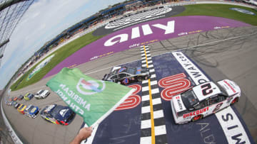 BROOKLYN, MICHIGAN - AUGUST 11: Brad Keselowski, driver of the #2 Discount Tire Ford, takes the green flag to start the Monster Energy NASCAR Cup Series Consumers Energy 400 at Michigan International Speedway on August 11, 2019 in Brooklyn, Michigan. (Photo by Matt Sullivan/Getty Images)