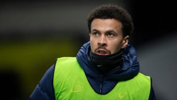 LONDON, ENGLAND - JANUARY 13: Dele Alli of Tottenham Hotspur warms up during the Premier League match between Tottenham Hotspur and Fulham at Tottenham Hotspur Stadium on January 13, 2021 in London, England. Sporting stadiums around England remain under strict restrictions due to the Coronavirus Pandemic as Government social distancing laws prohibit fans inside venues resulting in games being played behind closed doors. (Photo by Visionhaus)
