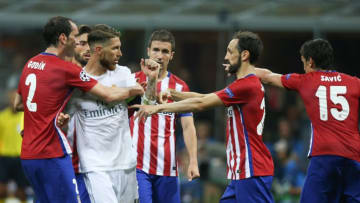 Diego Godin of Club Atletico de Madrid, Sergio Ramos of Real Madrid, Juanfran of Club Atletico de Madrid, Stefan Savic of Club Atletico de Madrid during the UEFA Champions League final match between Real Madrid and Atletico Madrid on May 28, 2016 at the Giuseppe Meazza San Siro stadium in Milan, Italy.(Photo by VI Images via Getty Images)