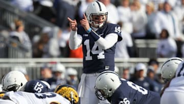 Nov 21, 2015; University Park, PA, USA; Penn State Nittany Lions quarterback Christian Hackenberg (14) signals during the first quarter against the Michigan Wolverines at Beaver Stadium. Mandatory Credit: Matthew O