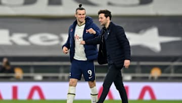 Tottenham Hotspur's Welsh midfielder Gareth Bale (L) with Tottenham Hotspur's interim head coach Ryan Mason (R) after the English Premier League football match between Tottenham Hotspur and Sheffield United at Tottenham Hotspur Stadium in London, on May 2, 2021. - - RESTRICTED TO EDITORIAL USE. No use with unauthorized audio, video, data, fixture lists, club/league logos or 'live' services. Online in-match use limited to 120 images. An additional 40 images may be used in extra time. No video emulation. Social media in-match use limited to 120 images. An additional 40 images may be used in extra time. No use in betting publications, games or single club/league/player publications. (Photo by Justin Setterfield / POOL / AFP) / RESTRICTED TO EDITORIAL USE. No use with unauthorized audio, video, data, fixture lists, club/league logos or 'live' services. Online in-match use limited to 120 images. An additional 40 images may be used in extra time. No video emulation. Social media in-match use limited to 120 images. An additional 40 images may be used in extra time. No use in betting publications, games or single club/league/player publications. / RESTRICTED TO EDITORIAL USE. No use with unauthorized audio, video, data, fixture lists, club/league logos or 'live' services. Online in-match use limited to 120 images. An additional 40 images may be used in extra time. No video emulation. Social media in-match use limited to 120 images. An additional 40 images may be used in extra time. No use in betting publications, games or single club/league/player publications. (Photo by JUSTIN SETTERFIELD/POOL/AFP via Getty Images)