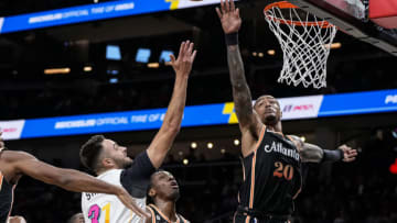 Atlanta Hawks forward John Collins (20) blocks a shot by Miami Heat guard Max Strus (31)( Dale Zanine-USA TODAY Sports)