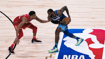 CHICAGO, ILLINOIS - FEBRUARY 16: LeBron James #2 of Team LeBron handles the ball against Giannis Antetokounmpo #24 of Team Giannis during the 69th NBA All-Star Game on February 16, 2020 at the United Center in Chicago, Illinois. (Photo by Lampson Yip - Clicks Images/Getty Images)