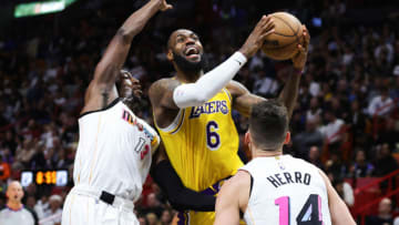 LeBron James #6 of the Los Angeles Lakers goes to the basket against Bam Adebayo #13 and Tyler Herro #14 of the Miami Heat(Photo by Megan Briggs/Getty Images)