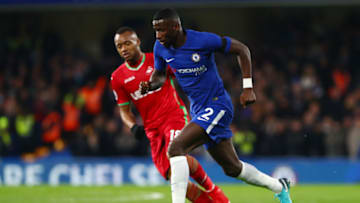 LONDON, ENGLAND - NOVEMBER 29: Antonio Rudiger of Chelsea takes the ball away from Jordan Ayew of Swansea City during the Premier League match between Chelsea and Swansea City at Stamford Bridge on November 29, 2017 in London, England. (Photo by Clive Rose/Getty Images)