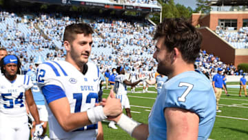 Duke football quarterback Gunnar Holmberg alongside North Carolina quarterback Sam Howell (Bob Donnan-USA TODAY Sports)