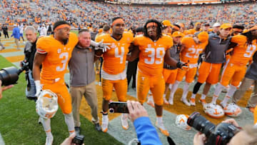 Nov 12, 2016; Knoxville, TN, USA; Tennessee Volunteers head coach Butch Jones celebrates with the team after the game against the Kentucky Wildcats at Neyland Stadium. Tennessee won 49 to 36. Mandatory Credit: Randy Sartin-USA TODAY Sports