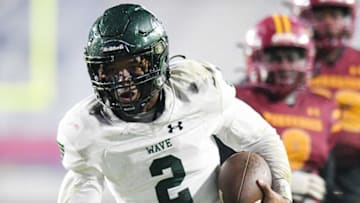 West Point’s Kahnen Daniels (2) runs against Laurel during the third quarter in the MHSAA Class 5A state championship game at Vaught-Hemingway Stadium in Oxford, Miss., Thursday, Nov. 30, 2023.