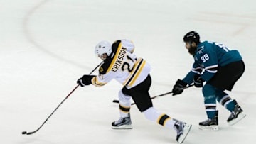 Mar 15, 2016; San Jose, CA, USA; Boston Bruins left wing Loui Eriksson (21) shoots and scores against San Jose Sharks goalie James Reimer (34) in the first period at SAP Center at San Jose. Mandatory Credit: John Hefti-USA TODAY Sports.