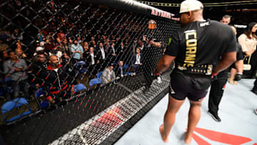 BUFFALO, NY - APRIL 08: (L-R) UFC Light Heavyweight Jimi Manuwa taunts UFC Light Heavyweight Champion Daniel Cormier from the stands during the UFC 210 event at the KeyBank Center on April 8, 2017 in Buffalo, New York. (Photo by Jeff Bottari/Zuffa LLC/Zuffa LLC via Getty Images)