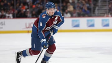 DENVER, COLORADO - JANUARY 26: Cale Makar #8 of the Colorado Avalanche advances the puck against the Anaheim Ducks in the second period at Ball Arena on January 26, 2023 in Denver, Colorado. (Photo by Matthew Stockman/Getty Images)