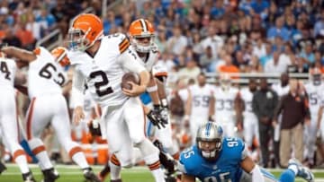 Aug 9, 2014; Detroit, MI, USA; Detroit Lions outside linebacker Kyle Van Noy (95) attempts to tackle Cleveland Browns quarterback Johnny Manziel (2) during the second quarter at Ford Field. Mandatory Credit: Tim Fuller-USA TODAY Sports