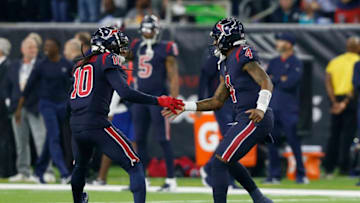 HOUSTON, TX - OCTOBER 25: DeAndre Hopkins #10 of the Houston Texans congratulates Deshaun Watson #4 after a touchdown pass in the third quarter at NRG Stadium on October 25, 2018 in Houston, Texas. (Photo by Tim Warner/Getty Images)