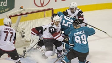 Nov 29, 2016; San Jose, CA, USA; San Jose Sharks center Chris Tierney (50) scores a goal against Arizona Coyotes goalie Mike Smith (41) during the second period at SAP Center at San Jose. Mandatory Credit: Neville E. Guard-USA TODAY Sports