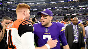 MINNEAPOLIS, MN - DECEMBER 17: Andy Dalton #14 of the Cincinnati Bengals and Case Keenum #7 of the Minnesota Vikings greet each other after the game on December 17, 2017 at U.S. Bank Stadium in Minneapolis, Minnesota. The Vikings defeated the Bengals 34-7 and clinched the NFC North Division title. (Photo by Hannah Foslien/Getty Images)