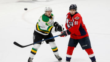 WINDSOR, ONTARIO - FEBRUARY 20: Defenseman Gerard Keane #45 of the London Knights skates against forward Pasquale Zito #91 of the Windsor Spitfires at WFCU Centre on February 20, 2020 in Windsor, Ontario, Canada. (Photo by Dennis Pajot/Getty Images)