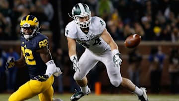ANN ARBOR, MI - OCTOBER 17: Safety Grayson Miller #44 of the Michigan State Spartans attempts an interception on a pass intended for wide receiver Amara Darboh #82 of the Michigan Wolverines during the college football game at Michigan Stadium on October 17, 2015 in Ann Arbor, Michigan. The Spartans defeated the Wolverines 27-23. (Photo by Christian Petersen/Getty Images)