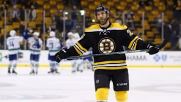 Jan 21, 2016; Boston, MA, USA; Boston Bruins center Max Talbot (25) skates off the ice as the Vancouver Canucks congratulate each other after their 4-2 win at TD Garden. Mandatory Credit: Winslow Townson-USA TODAY Sports