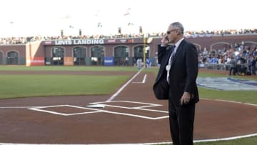 Oct 26, 2014; San Francisco, CA, USA; MLB newly elected commissioner Rob Manfred talks on a phone on the field before game five of the 2014 World Series between the San Francisco Giants and the Kansas City Royals at AT&T Park. Mandatory Credit: Christopher Hanewinckel-USA TODAY Sports