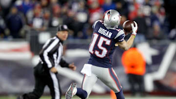 Dec 12, 2016; Foxborough, MA, USA; New England Patriots wide receiver Chris Hogan (15) catches a pass from New England Patriots quarterback Tom Brady (not seen) and runs for a touchdown agains the Baltimore Ravens during the second half at Gillette Stadium. Mandatory Credit: Stew Milne-USA TODAY Sports