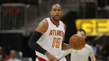 Feb 19, 2016; Atlanta, GA, USA; Atlanta Hawks center Al Horford (15) dribbles against the Miami Heat in the first quarter at Philips Arena. Mandatory Credit: Brett Davis-USA TODAY Sports
