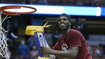 March 26, 2016; Anaheim, CA, USA; Oklahoma Sooners guard Buddy Hield (24) cuts the net and celebrates the 80-68 victory against Oregon Ducks to win the West regional final of the NCAA Tournament at Honda Center. Mandatory Credit: Richard Mackson-USA TODAY Sports