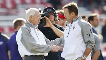 Oct 18, 2014; Norman, OK, USA; Oklahoma Sooners head coach Bob Stoops (right) shakes hands with Kansas State Wildcats head coach Bill Snyder (left) before the game at Gaylord Family - Oklahoma Memorial Stadium. Mandatory Credit: Kevin Jairaj-USA TODAY Sports