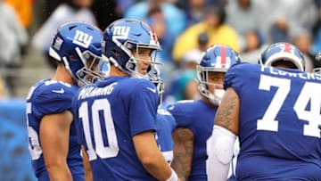 New York Giants. Giants huddle (Photo by Mike Lawrie/Getty Images)
