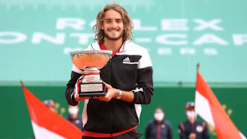 MONTE-CARLO, MONACO - APRIL 18: Stefanos Tsitsipas of Greece poses with the winners trophy after the Men's Final match on day eight of the Rolex Monte-Carlo Masters at Monte-Carlo Country Club on April 18, 2021 in Monte-Carlo, Monaco. Sporting stadiums around Monaco remain under strict restrictions due to the Coronavirus Pandemic as Government social distancing laws prohibit fans inside venues resulting in games being played behind closed doors. (Photo by Alexander Hassenstein/Getty Images)