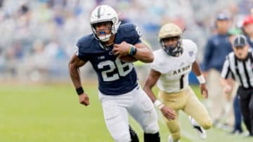 Penn State running back Saquon Barkley (26) picks up yardage against Akron at Beaver Stadium in University Park, Pa., on Saturday, Sept. 2, 2017. The host Nittany Lions won, 52-0, as Barkley rushed for 172 yards and two scores. (Abby Drey/Centre Daily Times/TNS via Getty Images)