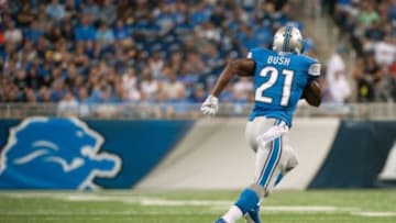 Aug 22, 2014; Detroit, MI, USA; Detroit Lions running back Reggie Bush (21) runs for a touchdown during the game against the Jacksonville Jaguars at Ford Field. Mandatory Credit: Tim Fuller-USA TODAY Sports
