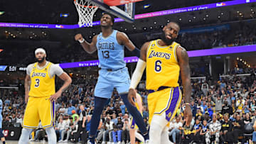 MEMPHIS, TENNESSEE - APRIL 26: Jaren Jackson Jr. #13 of the Memphis Grizzlies reacts during the second half against Anthony Davis #3 of the Los Angeles Lakers and LeBron James #6 of the Los Angeles Lakers during Game Five of the Western Conference First Round Playoffs at FedExForum on April 26, 2023 in Memphis, Tennessee. NOTE TO USER: User expressly acknowledges and agrees that, by downloading and or using this photograph, User is consenting to the terms and conditions of the Getty Images License Agreement. (Photo by Justin Ford/Getty Images)