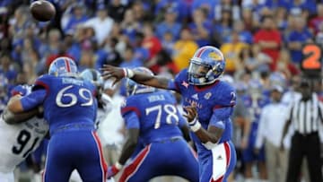 Sep 3, 2016; Lawrence, KS, USA; Kansas Jayhawks quarterback Montell Cozart (2) drops back to pass against the Rhode Island Rams in the first half at Memorial Stadium. Mandatory Credit: John Rieger-USA TODAY Sports