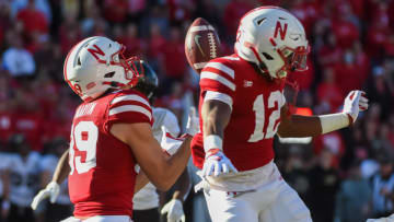 LINCOLN, NE - OCTOBER 30: Punt returner Oliver Martin #89 of the Nebraska Cornhuskers catches a punt in front of defensive back Marques Buford Jr. #12 against the Purdue Boilermakers in the second half at Memorial Stadium on October 30, 2021 in Lincoln, Nebraska. (Photo by Steven Branscombe/Getty Images)